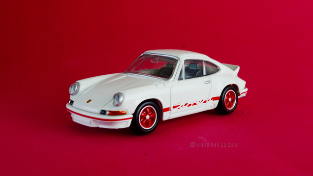 Illustration for article titled Rennsport Reunion: 1/61 Tomica Premium 911 Carrera RS 2.7